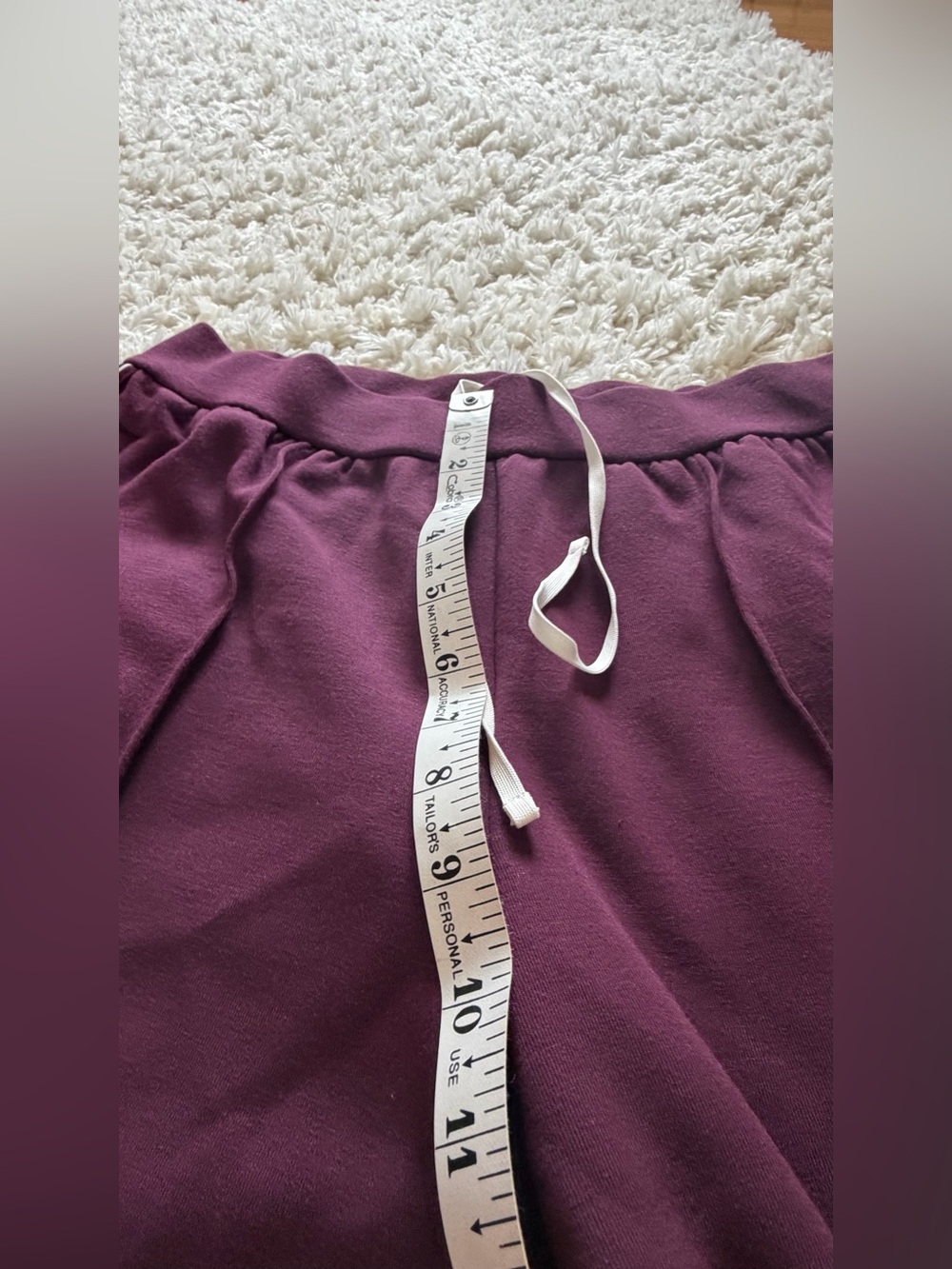 ALO Yoga Wide-Leg Track Pants in Plum with White Side Stripes - Picture 6 of 10